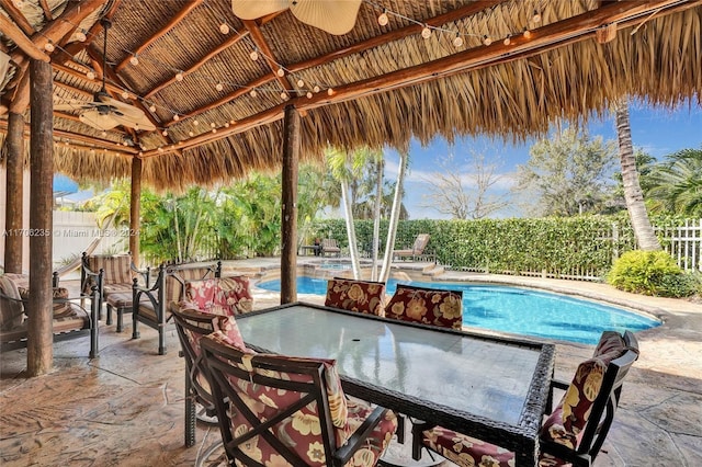 view of swimming pool featuring a gazebo, a patio area, and ceiling fan