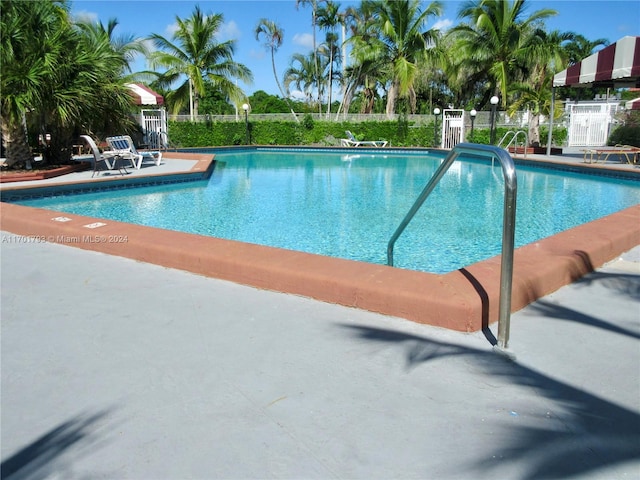 view of swimming pool featuring a patio