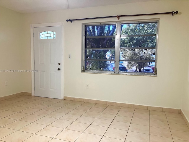 view of tiled foyer entrance