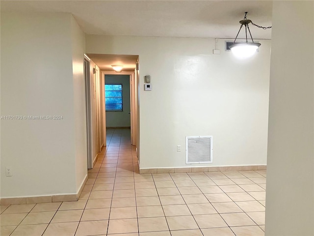 interior space featuring light tile patterned floors