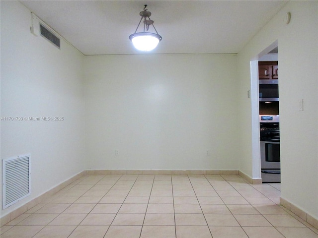 20275 NE 2nd Ave Unit 16, Miami, FL 33179 - unfurnished room featuring light tile patterned floors