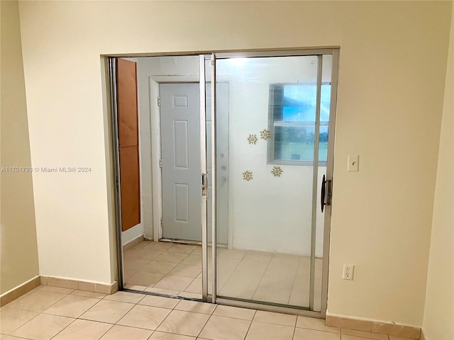 interior space with light tile patterned floors