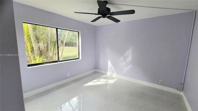 unfurnished room with ceiling fan