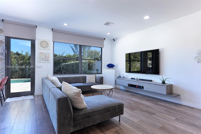 living room with light hardwood / wood-style floors