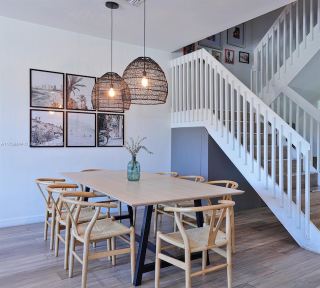 dining room featuring hardwood / wood-style flooring