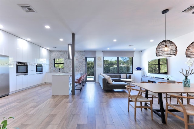 dining area featuring light hardwood / wood-style floors