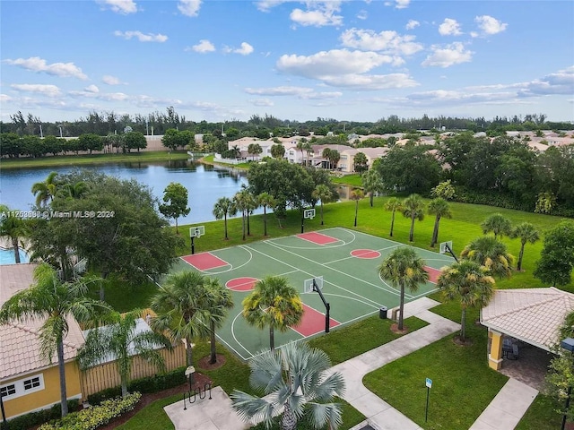 view of basketball court featuring a water view