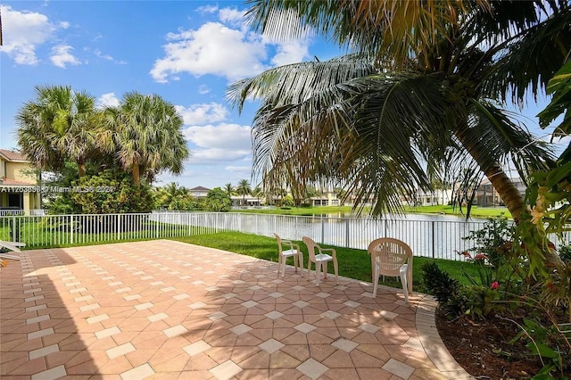 view of patio / terrace featuring a water view