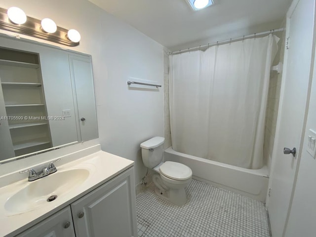 full bathroom with tile patterned flooring, shower / bath combination with curtain, vanity, and toilet