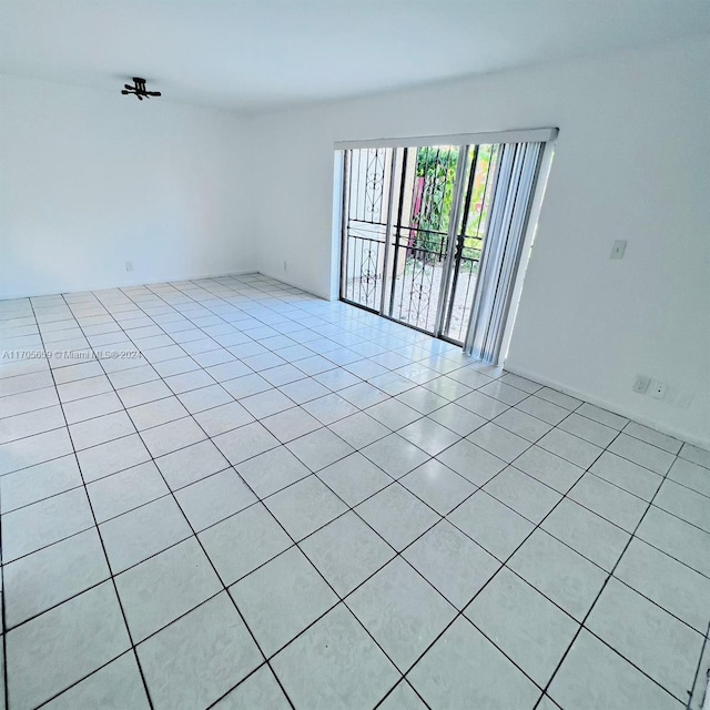 view of tiled empty room