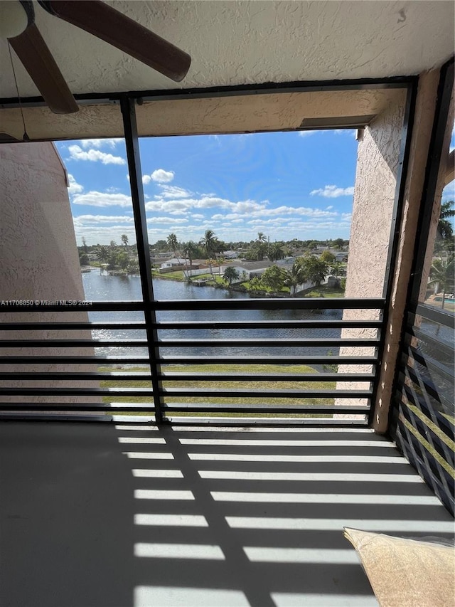 2711 NW 104th Ave Unit 406, Sunrise, FL 33322 - balcony featuring ceiling fan and a water view