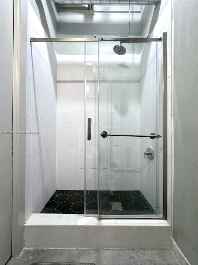 bathroom with an enclosed shower