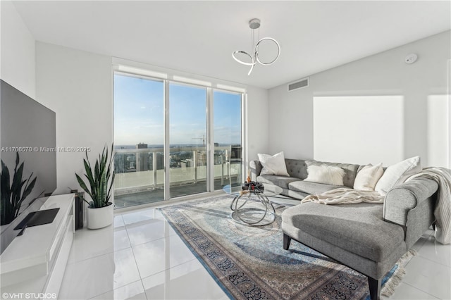 tiled living room with floor to ceiling windows