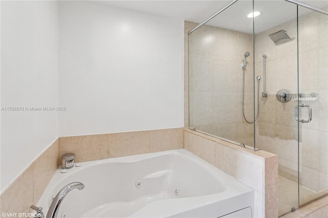 bathroom with shower with separate bathtub