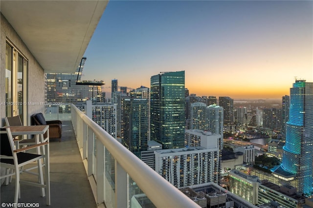 view of balcony at dusk