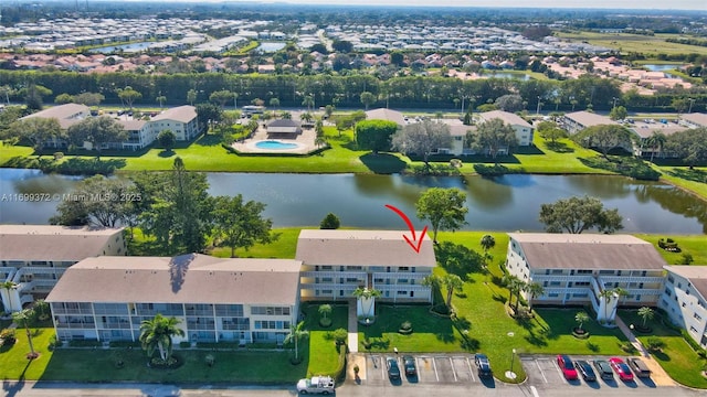 drone / aerial view featuring a water view