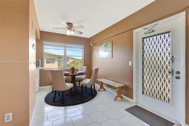 dining space featuring ceiling fan