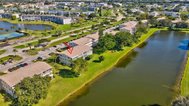 drone / aerial view featuring a water view