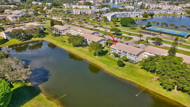 drone / aerial view with a water view