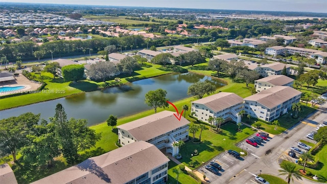 drone / aerial view featuring a water view