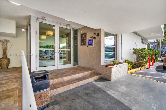 doorway to property featuring french doors