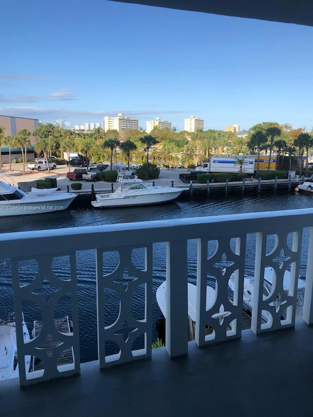 balcony featuring a water view