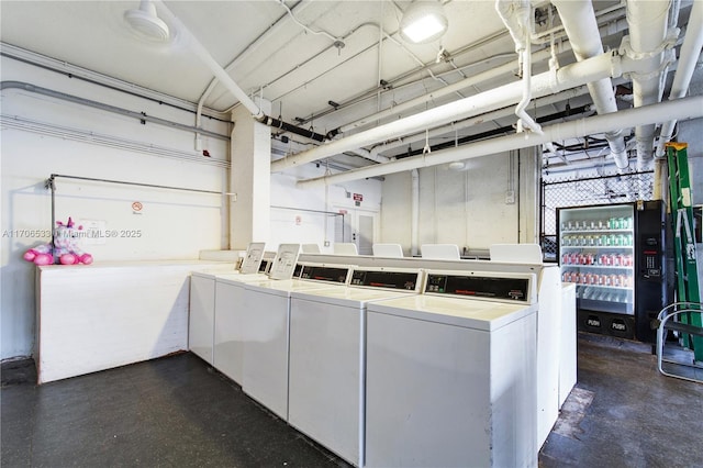 clothes washing area featuring independent washer and dryer