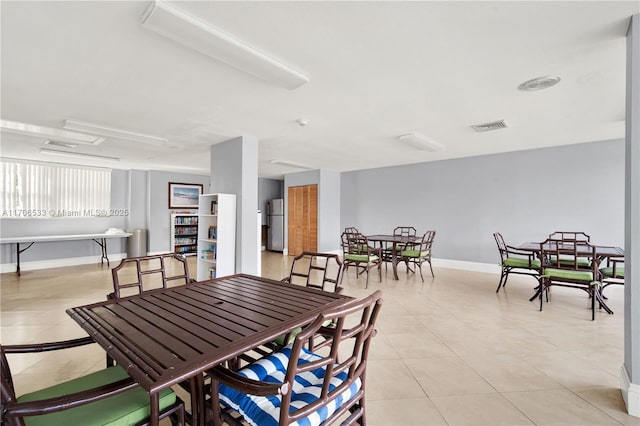 view of tiled dining space