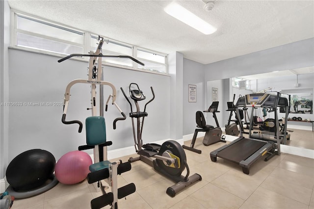 exercise area with a textured ceiling