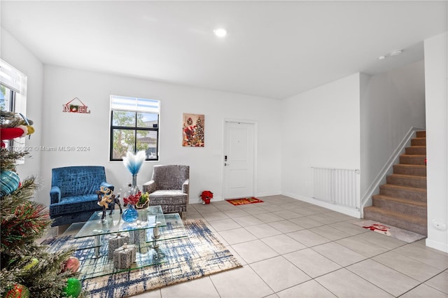 interior space featuring a wealth of natural light and light tile patterned flooring