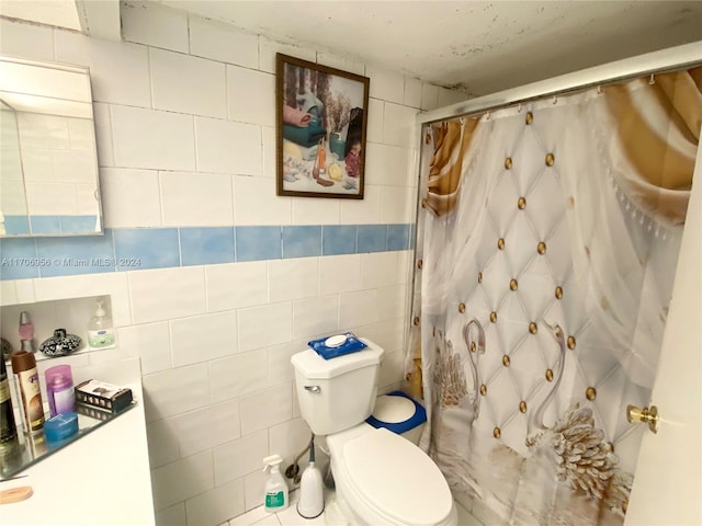 bathroom featuring toilet, tile walls, and a shower with shower curtain