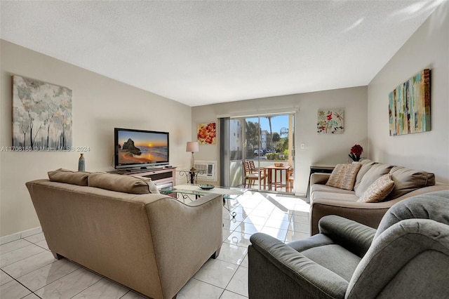 tiled living room featuring a textured ceiling