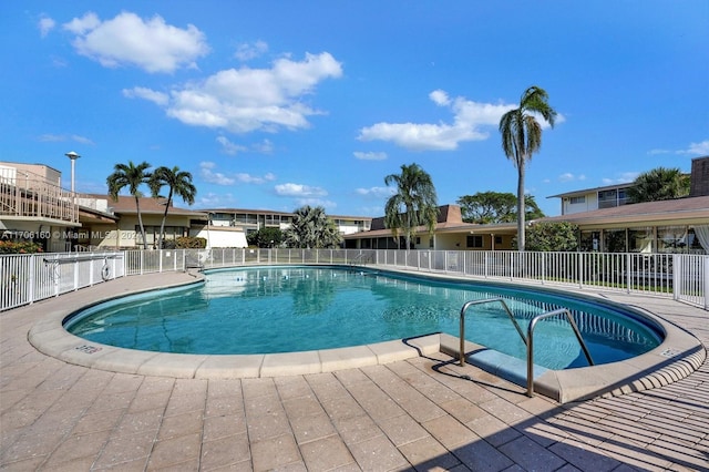 view of pool featuring a patio area