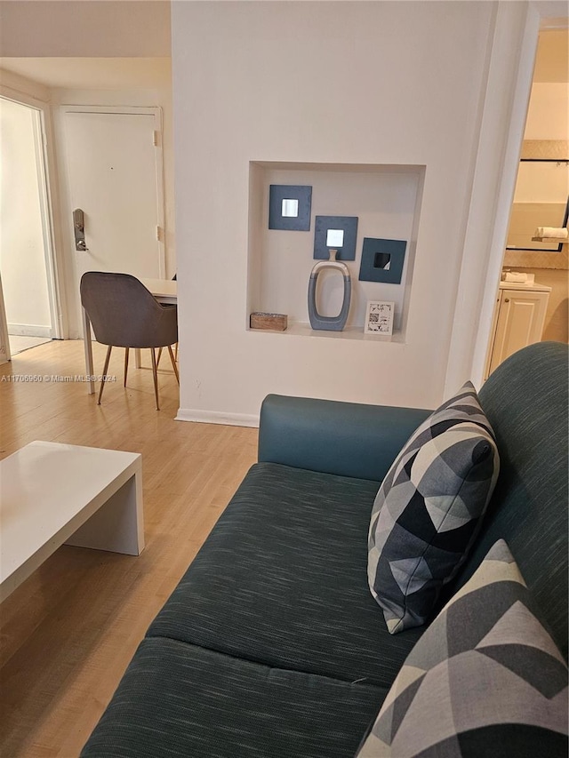 living room with light hardwood / wood-style floors