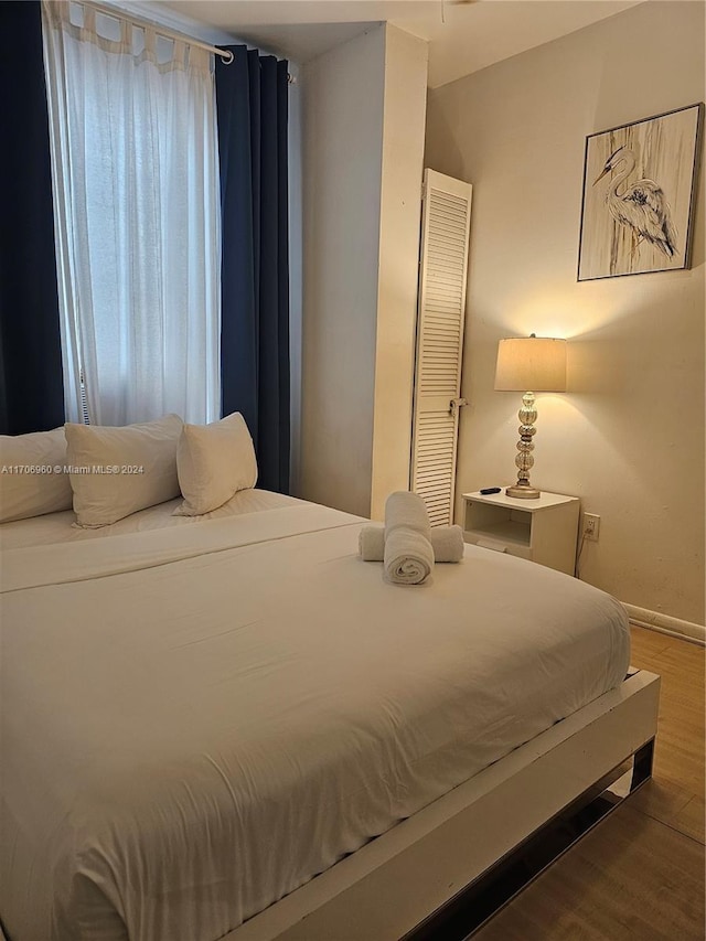 bedroom featuring hardwood / wood-style flooring