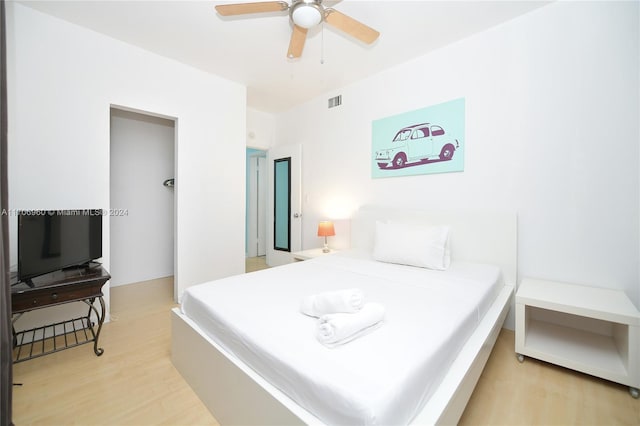 bedroom featuring ceiling fan and wood-type flooring