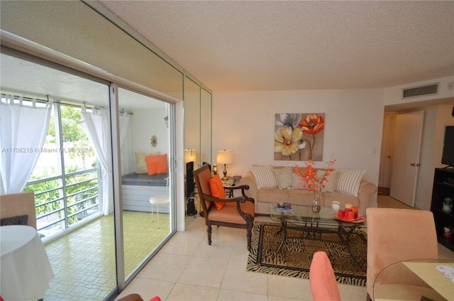 living room with a textured ceiling