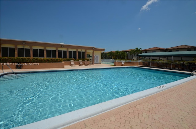 view of pool featuring a patio area