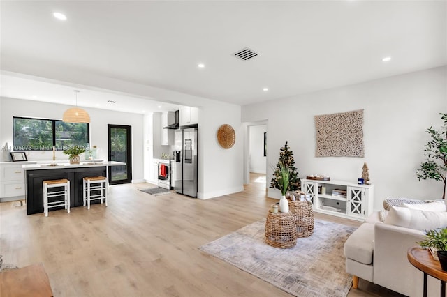 living room featuring light hardwood / wood-style flooring