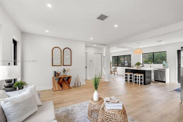 living room featuring light wood-type flooring