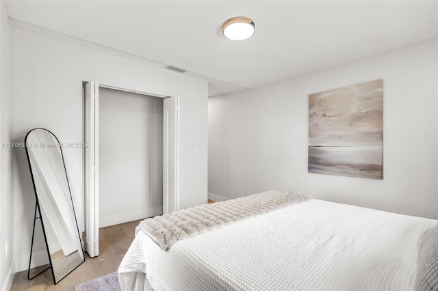 bedroom featuring light hardwood / wood-style floors