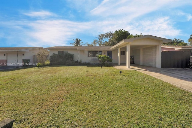 ranch-style house with a front yard and a garage