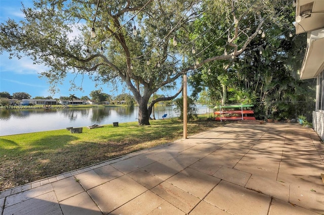 view of patio / terrace featuring a water view