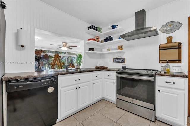 kitchen featuring stainless steel electric range oven, sink, black dishwasher, white cabinetry, and wall chimney range hood