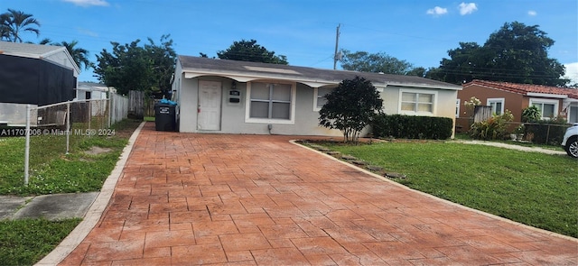 view of front of home with a front lawn