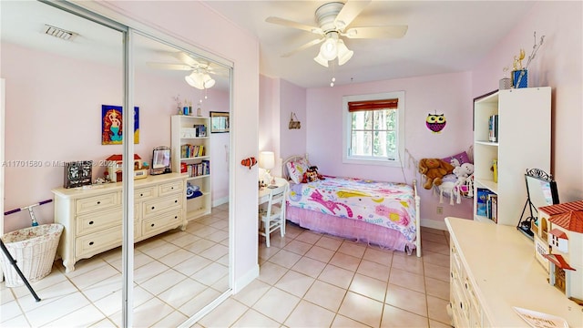 bedroom featuring ceiling fan and light tile patterned floors