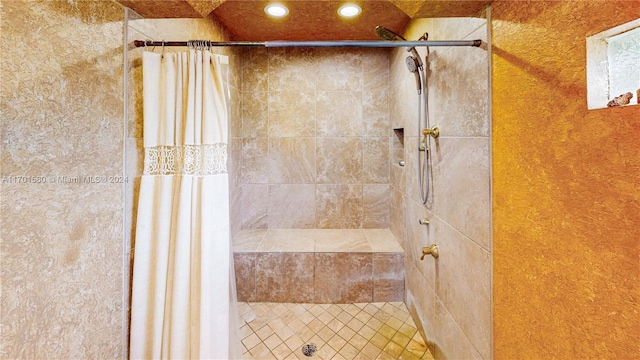 bathroom featuring a shower with curtain