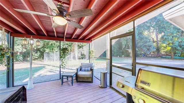 sunroom / solarium with ceiling fan and plenty of natural light