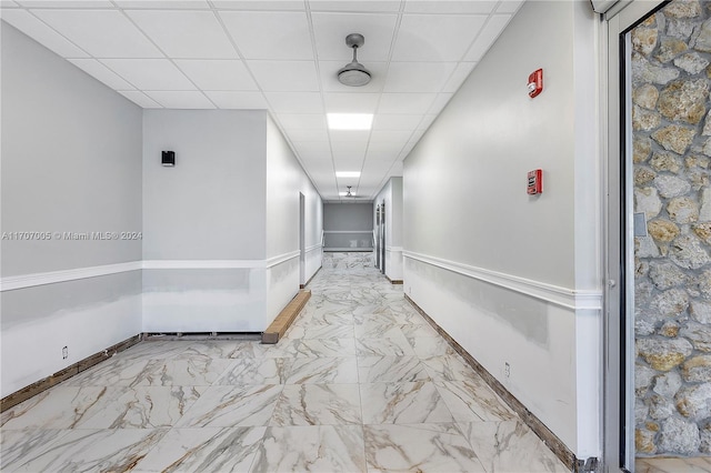 5 Bluebill Unit 701, Naples, FL 34108 - corridor with a drop ceiling and marble finish floors