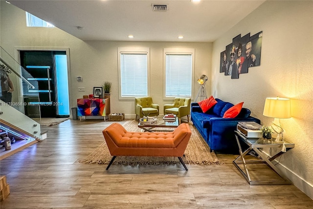 sitting room with hardwood / wood-style floors